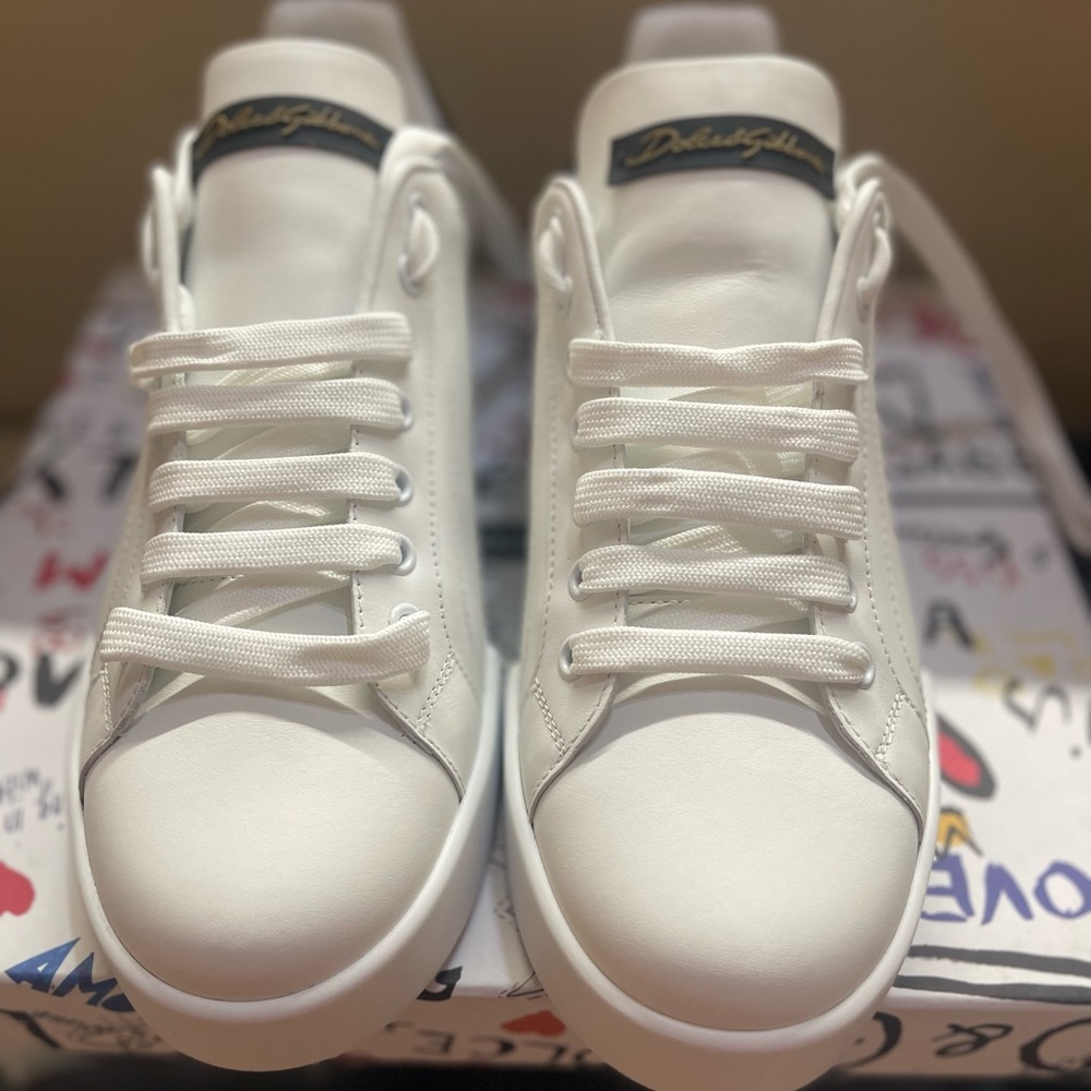 - Dolce and Gabbana white leather Portofino sneakers